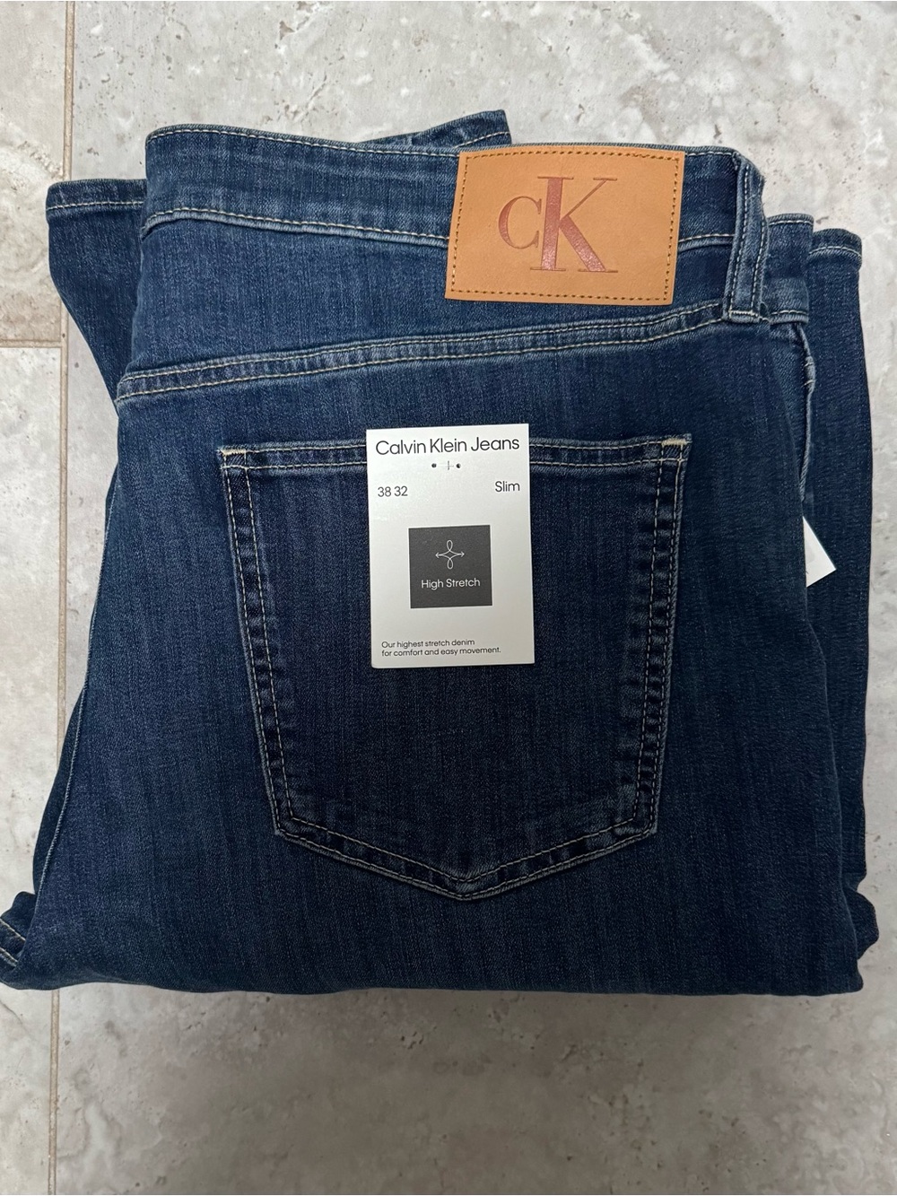 Calvin Klein Slim Fit blue Jeans with Tan Patch 38w/32L